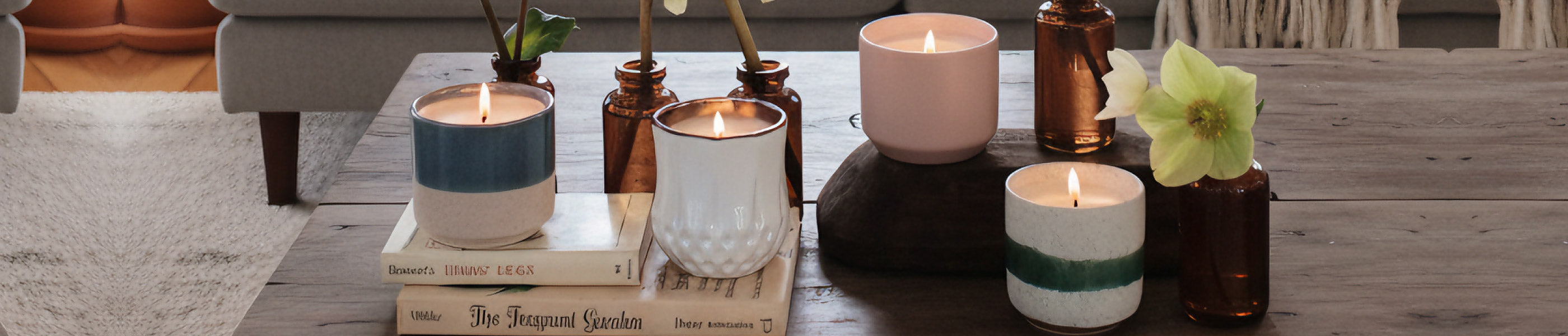 Candles on a coffee table with decorative items in a home setting