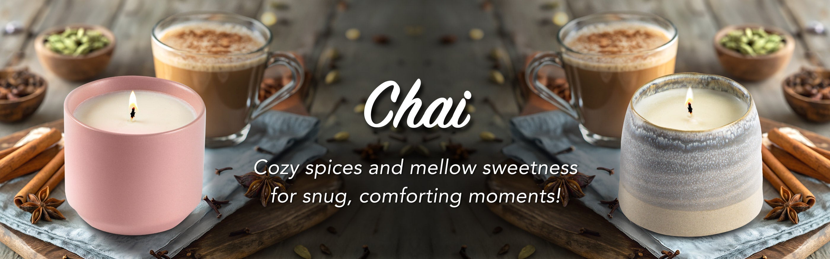 Candle and chai tea with spices on a wooden surface, featuring the brand 'Chai'.