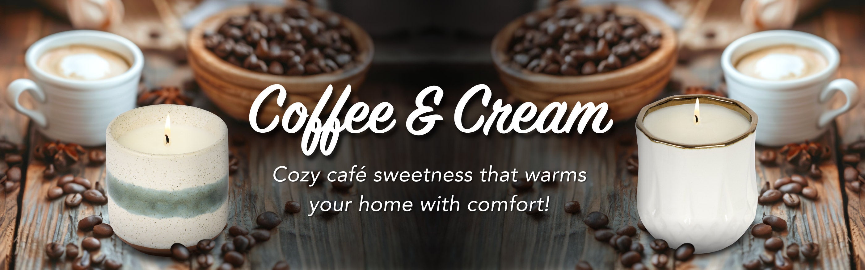 Candle with coffee and cream text and coffee beans on a wooden surface